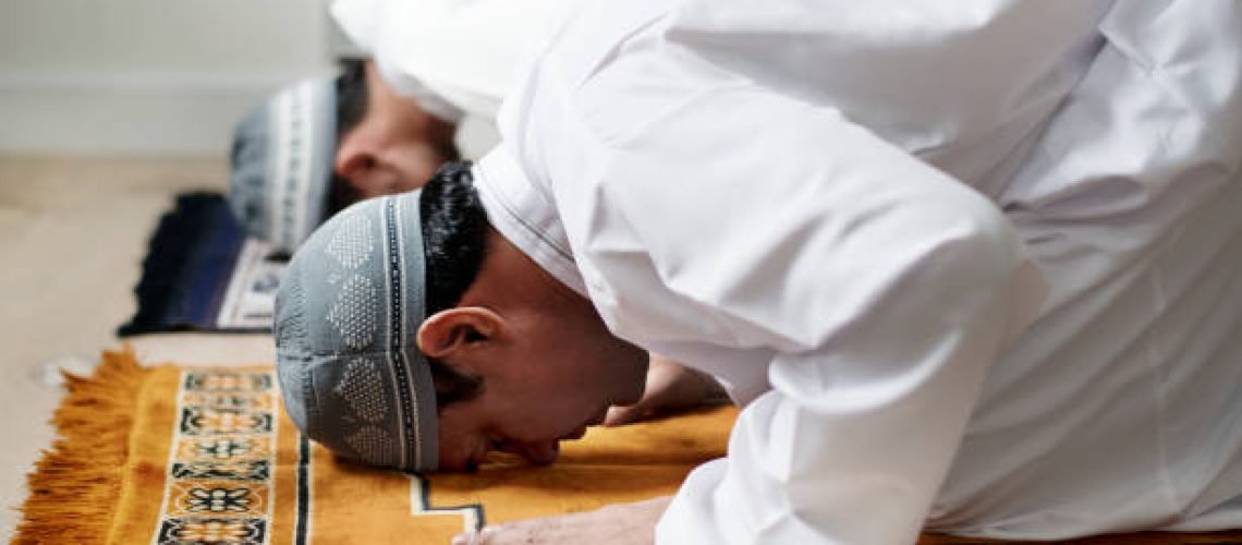 Muslim men praying during Ramadan